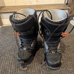Thirty two leashed snowboarding boots